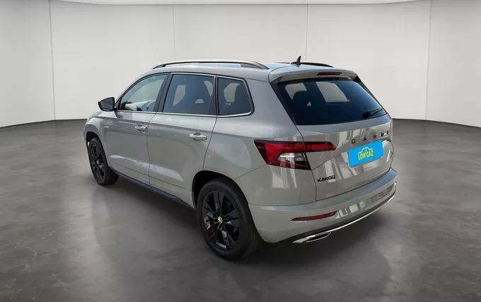 SKODA KAROQ 2.0 TDI 150 ch SCR 4x4 DSG7 Sportline extérieur trois quart arrière gauche 2130139
