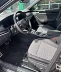 Miniature SKODA OCTAVIA Combi 1.5 TSI Hybrid 150 ch ACT DSG7 Sportline extérieur trois quart arrière gauche 3607
