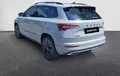 Miniature SKODA KAROQ 1.5 TSI Evo 2 150 ch ACT DSG7 Sportline extérieur trois quart arrière gauche 4715