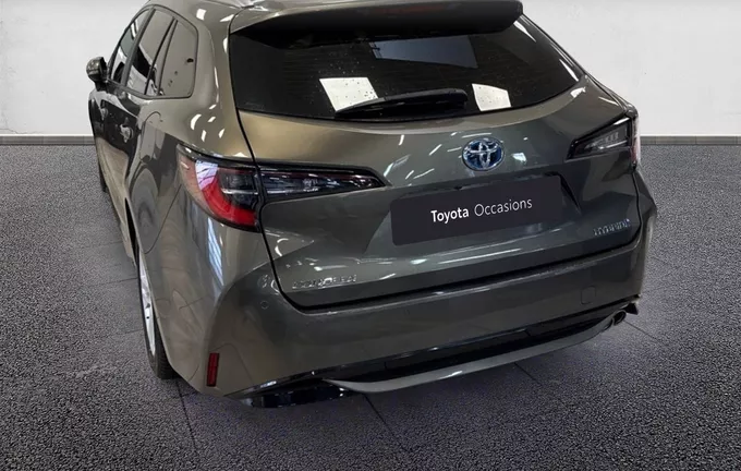 TOYOTA COROLLA Touring Sports Pro Hybride 184h Dynamic Business extérieur trois quart arrière gauche 1104098