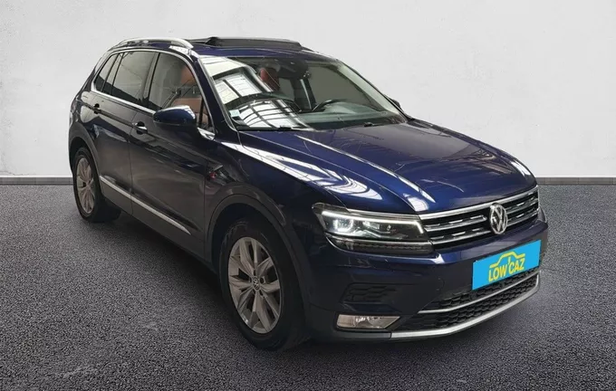 VOLKSWAGEN TIGUAN 2.0 TDI 150 DSG7 4Motion Carat extérieur trois quart avant droit 213299