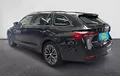 Miniature SKODA OCTAVIA Combi 2.0 TDI 150 ch DSG7 Business extérieur trois quart arrière gauche 213089
