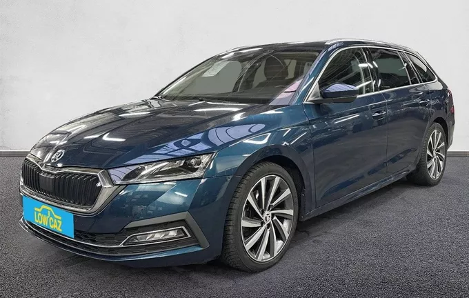 SKODA OCTAVIA Combi 2.0 TDI 150 ch DSG7 4x4 Style extérieur trois quart avant gauche 213747