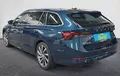 Miniature SKODA OCTAVIA Combi 2.0 TDI 150 ch DSG7 4x4 Style extérieur trois quart arrière gauche 213747