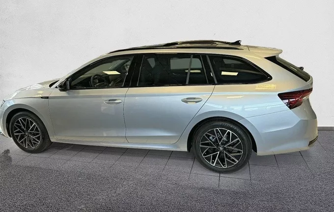 SKODA OCTAVIA Combi 1.5 TSI Hybrid 150 ch ACT DSG7 Sportline extérieur côté gauche 0655