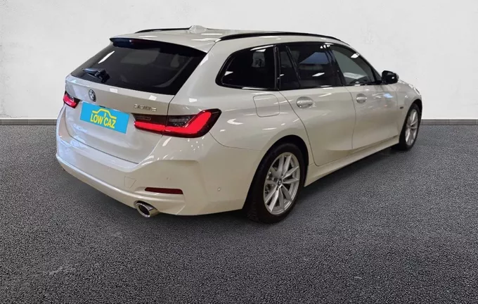 BMW SERIE 3 Touring 330e 292 ch BVA8 Business Design extérieur trois quart arrière droit 213461