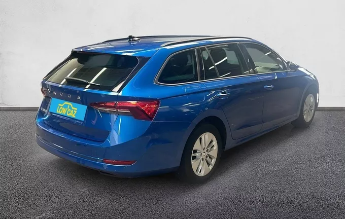 SKODA OCTAVIA Combi 2.0 TDI 150 ch DSG7 Business extérieur trois quart arrière droit 213559