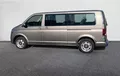 Miniature VOLKSWAGEN UTILITAIRES CARAVELLE 6.1 2.0 TDI 150 BMT Longue DSG7 4Motion Confortline extérieur trois quart arrière gauche 106223