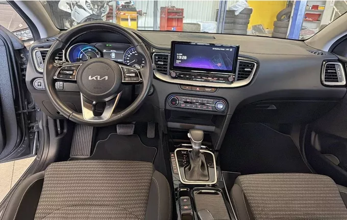 KIA CEED SW 1.6 GDi Hybride Rechargeable 141ch DCT6 Active extérieur trois quart avant droit 213249