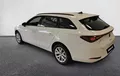Miniature SEAT LEON Sportstourer 2.0 TDI 115 BVM6 Business extérieur trois quart arrière gauche 20387
