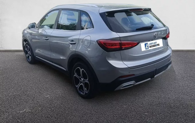 MG ZS 1.5 L Hybrid+ 197 ch Comfort extérieur trois quart arrière gauche 601185
