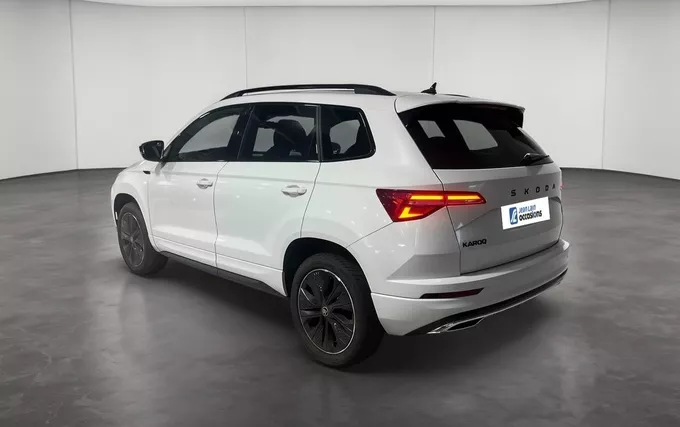 SKODA KAROQ 1.5 TSI Evo 2 150 ch ACT DSG7 Sportline extérieur trois quart arrière gauche 2133165