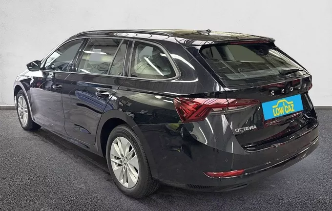 SKODA OCTAVIA Combi 2.0 TDI 150 ch DSG7 Business extérieur trois quart arrière gauche 213463