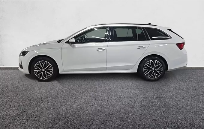SKODA OCTAVIA Combi 1.5 TSI Hybrid 150 ch ACT DSG7 Selection extérieur trois quart arrière gauche 2126695
