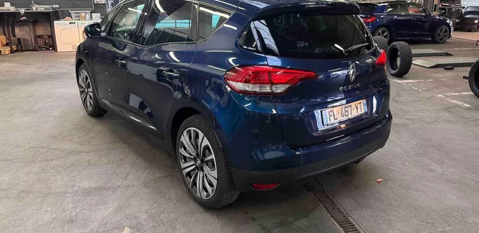 RENAULT SCENIC TCe 115 FAP Trend extérieur trois quart arrière gauche 213661