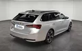 Miniature SKODA OCTAVIA Combi 2.0 TDI 150 ch SCR DSG7 Sportline extérieur trois quart arrière droit 2131907
