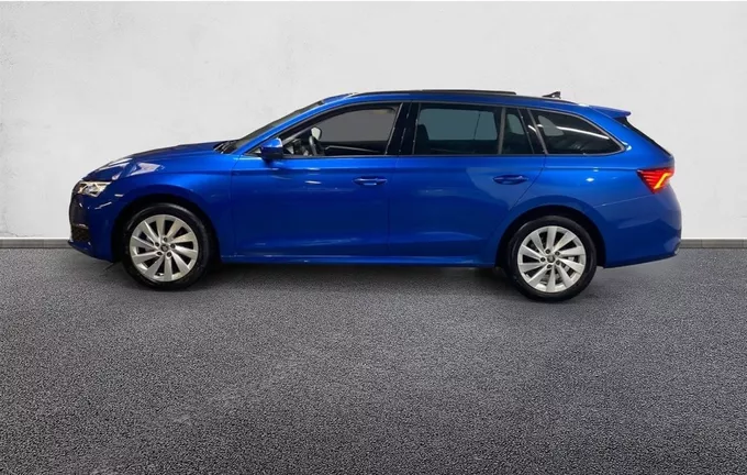 SKODA OCTAVIA Combi 1.5 TSI Hybrid 150 ch ACT DSG7 Selection extérieur trois quart arrière gauche 2132222