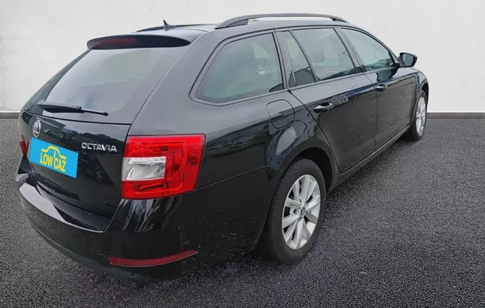 SKODA OCTAVIA Combi 2.0 TDI 150 ch SCR FAP DSG7 Business extérieur trois quart arrière droit 213274