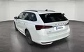 Miniature SKODA OCTAVIA Combi 1.5 TSI Hybrid 150 ch ACT DSG7 Selection extérieur trois quart arrière gauche 2131908