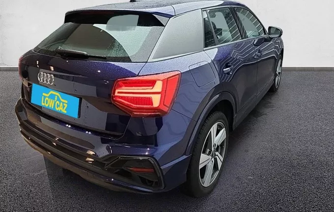 AUDI Q2 30 TDI 116 S tronic 7 S line extérieur trois quart arrière droit 213676