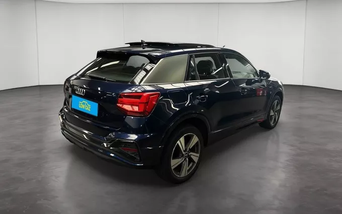 AUDI Q2 30 TDI 116 S tronic 7 S line extérieur trois quart arrière droit 213676